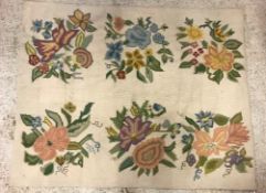 A 20th Century wool cross stitch on canv