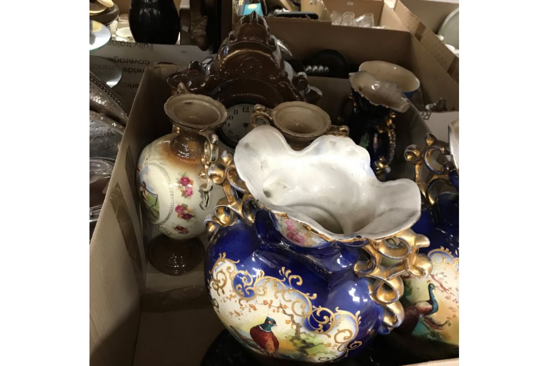 A box containing early 20th Century transfer decorated clock garniture comprising clock and two - Image 1 of 2