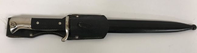A German Third Reich K98 bayonet having a fullered blade inscribed 