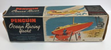 A Milbro products Ailsa yacht model sailboat, together with a Penguin 16