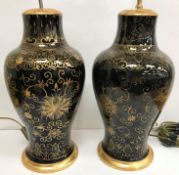 A pair of 19th century Chinese mirror black (Wujin) balaster shaped vases with all over scrolling