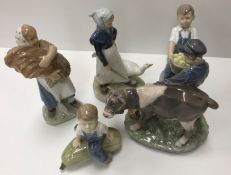 A collection of five various Royal Copenhagen figures including 