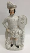 A collection of thirteen various Staffordshire figures including 