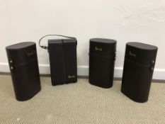 A collection of four wicker Harrods hampers together with four Harrods bottle carriers and three