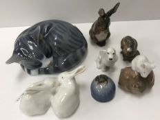 A collection of seven Royal Copenhagen animal figures including 