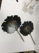 A pair of Victorian black lacquered flor