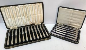 A cased set of twelve silver handled but