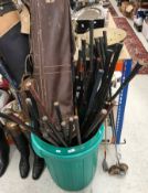 A collection of assorted vintage golf cl