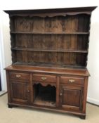 A 20th Century oak dresser in the 18th C