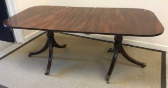 A late Georgian and later mahogany twin