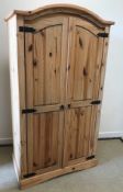 A modern pine two door wardrobe of armoi