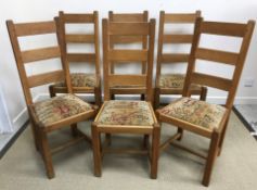 A set of six oak ladder back dining chai