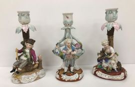 Three Dresden candlesticks, each with ch
