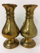 A pair of Chinese brass baluster shaped
