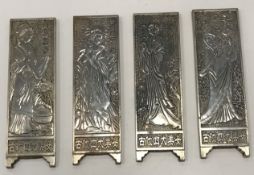 A set of four Chinese white metal cast m