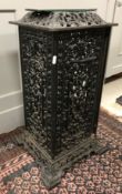 An early 20th Century cast iron greenhouse / conservatory heater with urn and scrolling foliate