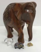 Three boxes of assorted elephant ornaments to include wooden and china examples