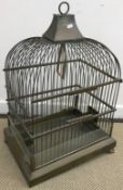 A brass bird cage of typical form, 47.