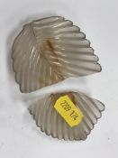 A pair of Chinese carved agate leaf bowls or dishes, with scroll work decorated wooden stands, 8.