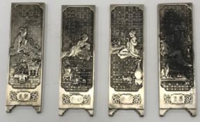 A set of four Chinese white metal cast miniature screen panels,