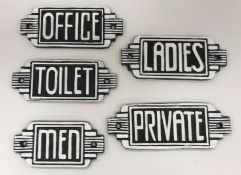 A collection of five cast metal Art Deco style door signs inscribed 