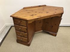A modern pine two door wardrobe, a corner dressing table,