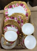 A Royal Albert Crown China Old English Rose pattern part tea set comprising eight cups and saucers,