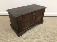 An 18th Century oak miniature coffer,