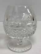 A collection of Waterford and other cut glass glassware to include wine glasses, brandy balloons,