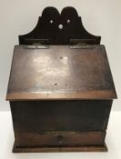 An 18th Century oak candle box,