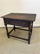 An 18th Century oak side table,