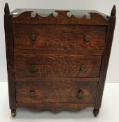 A 19th Century oak miniature table-top chest,