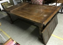 A 20th Century oak refectory style dining table in the 18th Century manner,