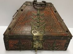 A circa 1900 Indian Kerala Netturpetti jewellery or dowry casket with all over scrollwork painted