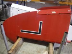 A De Havilland tail fin, red painted, approx 220 cm high, bearing Dove label inscribed 