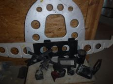 A small collection of various aeronautical dashboard gear including an altimeter,