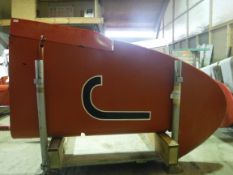 A De Havilland tail fin, red painted, approx 220 cm high, bearing Dove label inscribed 