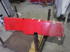 A pair of aeroplane tail elevator sections (probably Devon), red painted, 245 cm long,