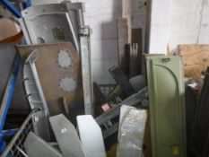 A stillage of various aluminium and other aeronautical panels, cowels, elevator sections, fairings,