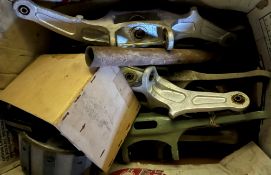 A box containing various aeronautical spares and parts including elevator levers,
