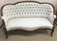 A Victorian walnut framed show frame sof