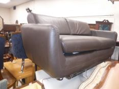 A Habitat brown leather upholstered two seat sofa,