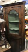 A 19th Century oak free-standing corner cupboard,