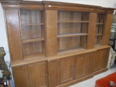 A 20th Century oak breakfront dresser in the Arts & Crafts manner,