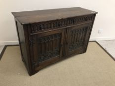A 20th Century carved oak dresser in the 17th Century style,
