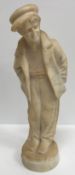 A carved alabaster figure of a young sailor, signed 