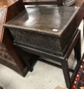 A 17th Century oak Bible box, the plain top with moulded edge inscribed 
