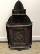 A 19th Century carved oak hanging wall corner cupboard,