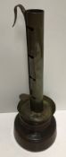 An 18th Century brass and treenware adjustable candle holder 27 cm high