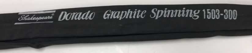 A collection of five various fishing rods including a Shakespeare Dorado graphite spinning rod